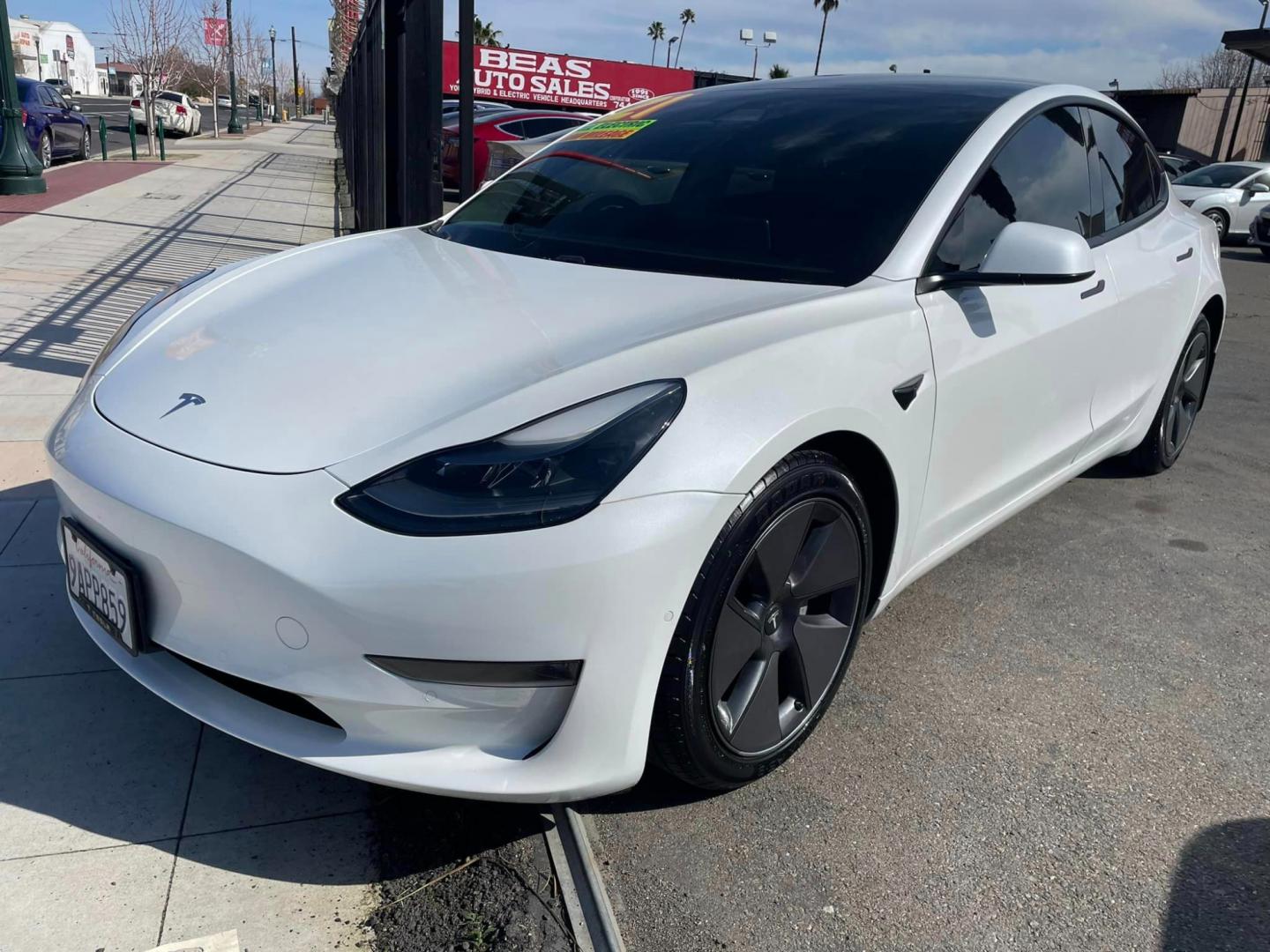 2021 WHITE /BLACK Tesla Model 3 Long Range (5YJ3E1EB8MF) with an ELECTRIC engine, 1A transmission, located at 744 E Miner Ave, Stockton, CA, 95202, (209) 944-5770, 37.956863, -121.282082 - Photo#3